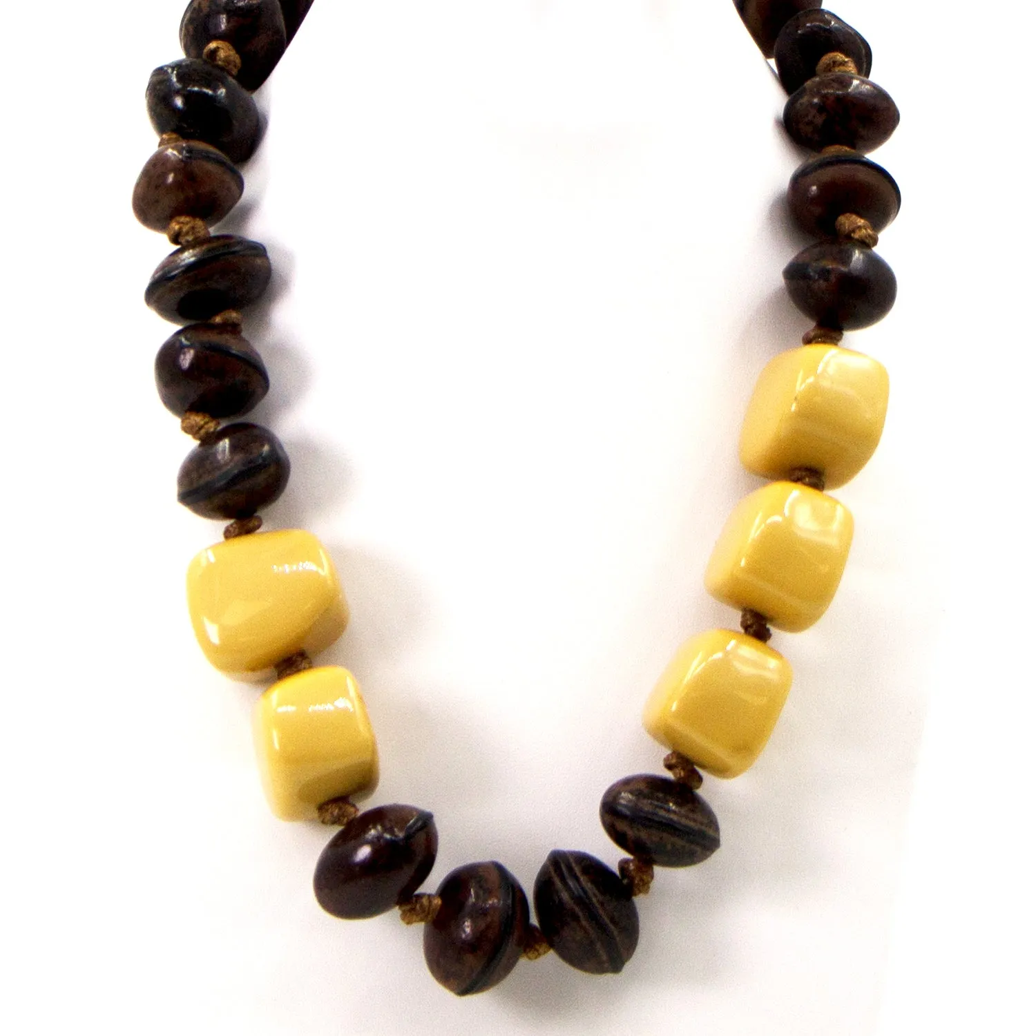 Earthy seed necklace with mustard resin accents