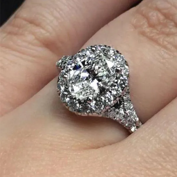 Oval Halo Subtle Split Shank Diamond Ring .67 Cttw 475A