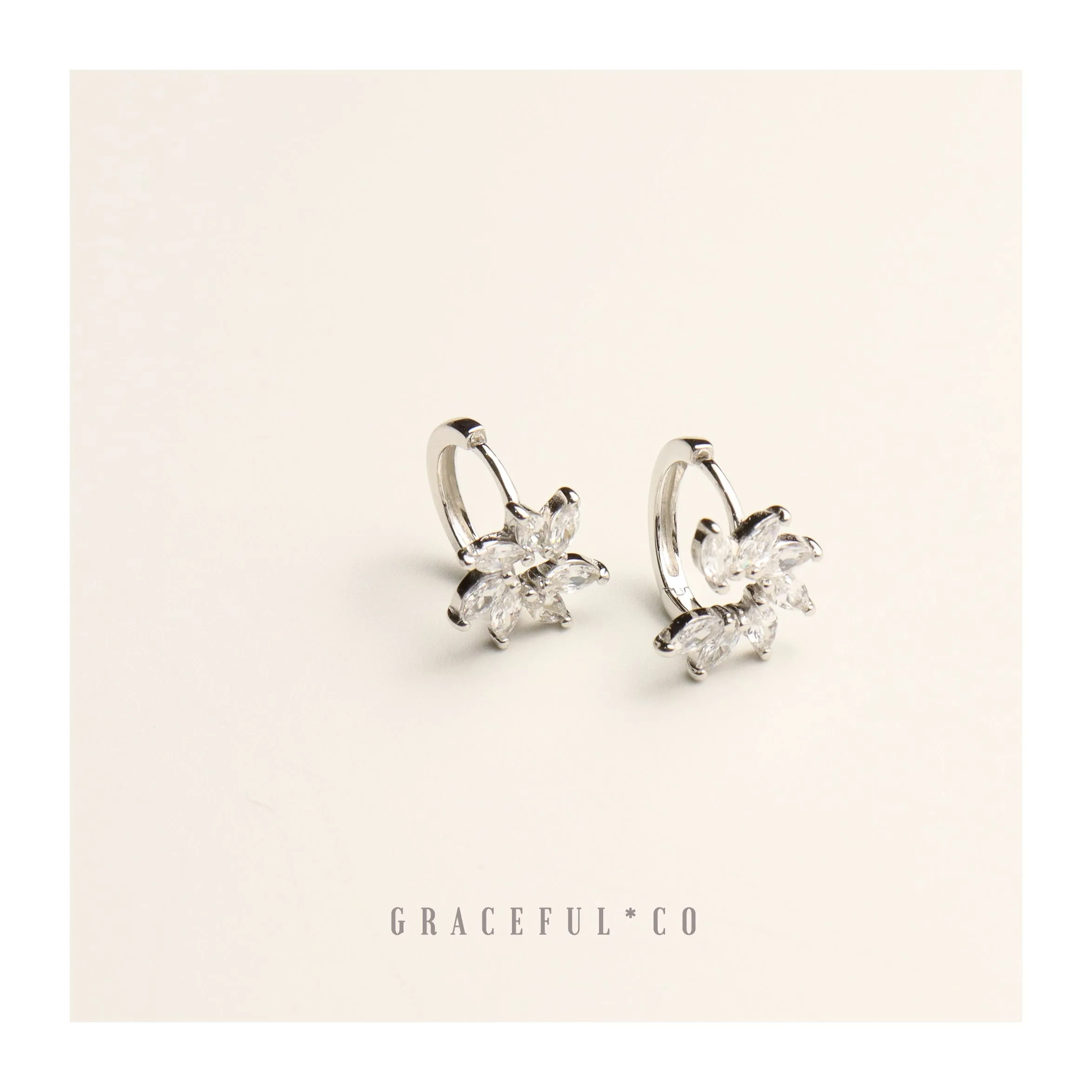 Sparkling Floral Huggie Earrings