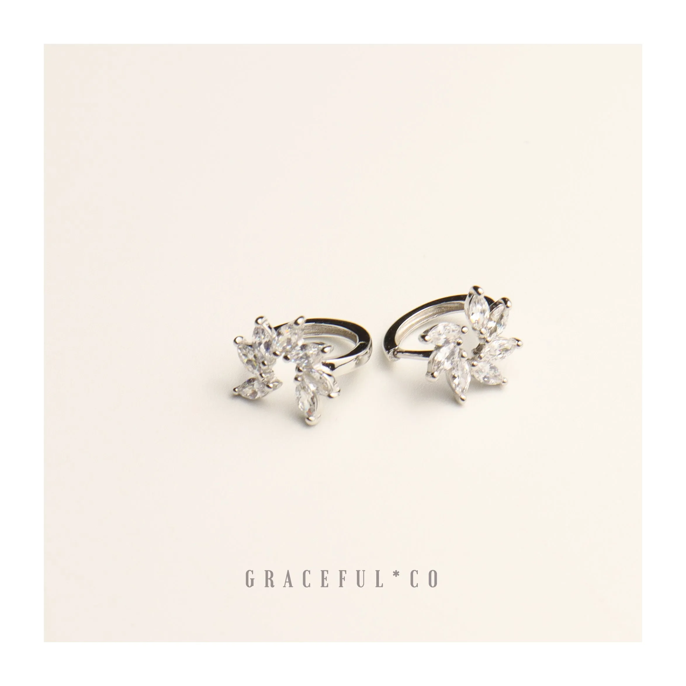 Sparkling Floral Huggie Earrings